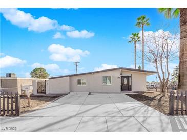 Remodeled single story home with new landscaping and driveway at 2318 Howard Dr, Las Vegas, NV 89104