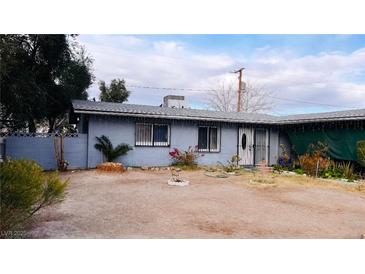 Ranch style home with a spacious yard and mature landscaping at 4130 Balboa Ave, Las Vegas, NV 89121