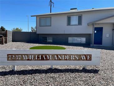 Charming two-story home with a low-maintenance yard and a decorative address display at 7237 William Anders Ave, Las Vegas, NV 89145