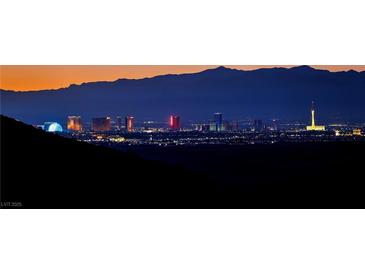 Stunning aerial view of a luxury home with mountain backdrop at 23 Via Tavolara, Henderson, NV 89011