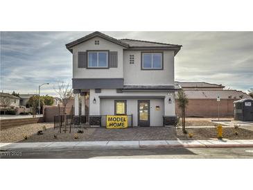 Two-story modern home with gray exterior and dark gray accents at 8405 Sycamore Creek St, Las Vegas, NV 89148