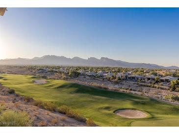 Luxury homes and golf course with scenic mountain backdrop at 9204 Tesoras Dr # 401, Las Vegas, NV 89144