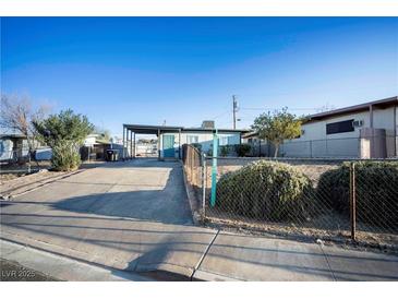Ranch style home with carport and fenced yard at 107 Manganese St, Henderson, NV 89015