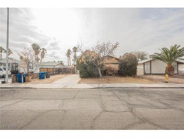 Ranch style home with mature landscaping and a spacious yard at 6443 Silverfield Dr, Las Vegas, NV 89103
