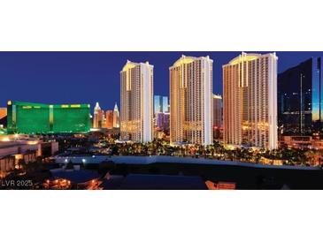 Luxury high-rise building with city views at night at 125 E Harmon Ave # 1702, Las Vegas, NV 89109