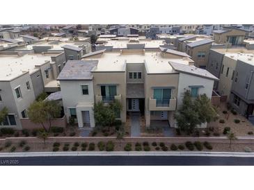 Aerial view of modern townhouses with landscaped yards at 11287 Idyllic Dr # 102, Las Vegas, NV 89135