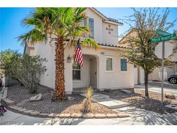 Two story house with attached garage and desert landscaping at 4924 Conglobate St, Las Vegas, NV 89122