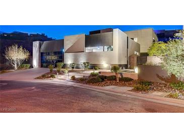 Modern home with landscaped yard and driveway at 5 Highland Cove Ln, Henderson, NV 89011