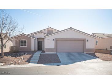 One-story house with attached garage and landscaping at 8145 Dancing Ave, Las Vegas, NV 89131