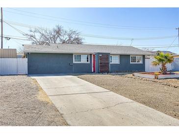 Charming single-story home featuring a well-maintained yard and a concrete driveway at 139 Ivy St, Henderson, NV 89015