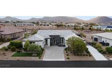 Luxury home with expansive backyard, pool, and tennis court at 1121 Du Fort Hills Ct, Henderson, NV 89002