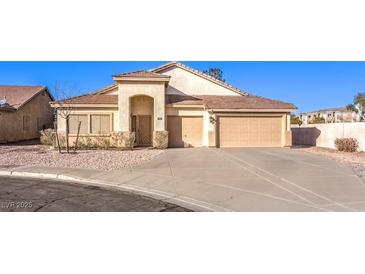 Charming single Gathering home with an attached two car garage and low maintenance landscaping at 1056 Flatfoot Ave, Henderson, NV 89012