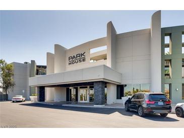 Modern building exterior with parking and landscaping at 8925 W Flamingo Rd # 216, Las Vegas, NV 89147