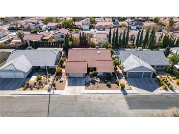 Charming single-Gathering homes nestled in a serene residential neighborhood with lush trees at 5873 Corazon Dr, Las Vegas, NV 89103