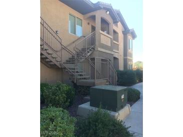 Exterior view of building, showing stairs and landscaping at 8985 S Durango Dr # 2094, Las Vegas, NV 89113