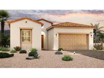 One-story home with desert landscaping and a two-car garage at 67 Ibiza Lake Dr, Henderson, NV 89011