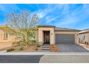 Charming single-story home with well-manicured landscaping and a two-car garage at 29 Sun Mirage Ave, Henderson, NV 89011