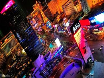 Night view of the Las Vegas strip, showcasing vibrant lights and bustling streets from above at 3722 Las Vegas Blvd # 3209, Las Vegas, NV 89158