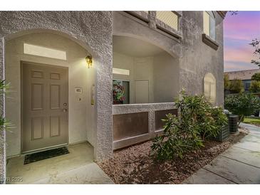 Well-maintained condo building with inviting entrance and landscaping at 700 Carnegie St # 4812, Henderson, NV 89052