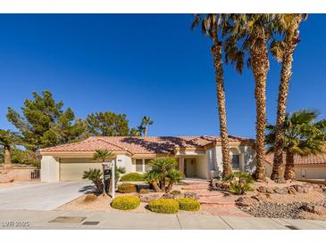 Charming single story home with desert landscaping and a two car garage at 9524 Quail Ridge Dr, Las Vegas, NV 89134