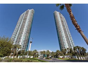 Luxury high rise condominiums with beautiful landscaping and a clear blue sky at 322 Karen Ave # 1101, Las Vegas, NV 89109