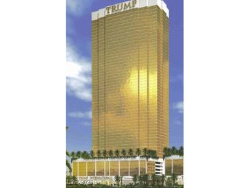 Striking full exterior view of Trump International Hotel with luxurious palm tree landscaping at 2000 N Fashion Show Dr # 2305, Las Vegas, NV 89109