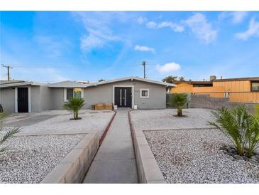 Updated single story home with landscaped front yard and walkway at 5509 Evergreen Ave, Las Vegas, NV 89107