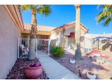 Charming single-story home with manicured front yard and walkway leading to the entrance at 3157 Faiss Dr, Las Vegas, NV 89134