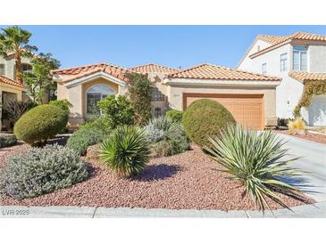 Charming single-story home featuring desert landscaping and a terracotta tile roof at 5517 Whiteleaf Ct, Las Vegas, NV 89149