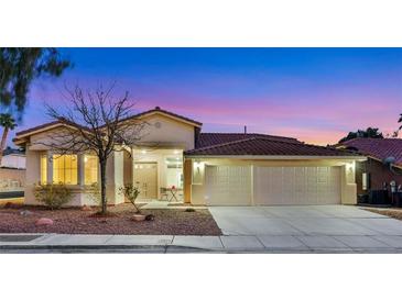 Charming single-story home featuring a well-maintained yard and a two-car garage at 2725 Cool Lilac Ave, Henderson, NV 89052