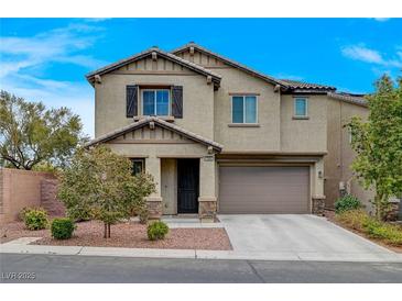 Charming two-story home featuring a two-car garage and well-maintained landscaping at 7856 Pyramid Peak St, Las Vegas, NV 89166