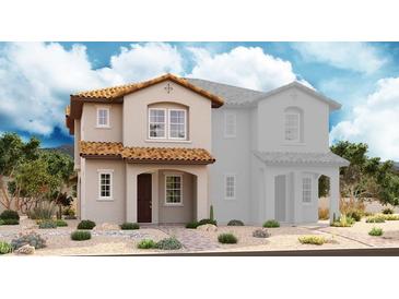 Charming two-story home with a brown tile roof and desert landscaping at 586 Celebratory Pl, Henderson, NV 89011