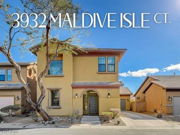 Charming two-story home features desert landscaping and neutral-toned exterior paint at 3932 Maldive Isle Ct, Las Vegas, NV 89129