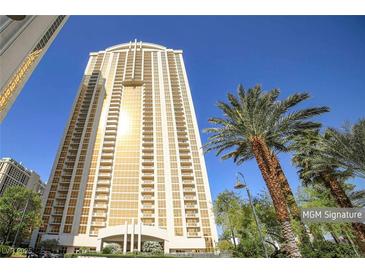 Modern high-rise condominium featuring private balconies, floor-to-ceiling windows, and stunning architectural details at 125 E Harmon Ave # 809, Las Vegas, NV 89109