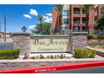 Welcome to Park Avenue Condominiums, featuring lush landscaping and a stately entrance sign at 19 E Agate Ave # 307, Las Vegas, NV 89123