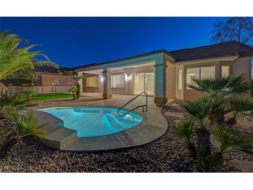 Inviting backyard with private spa, covered patio, lush landscaping, and serene ambiance, perfect for relaxation and outdoor enjoyment at 2820 Thunder Bay Ave, Henderson, NV 89052