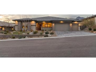 A stunning single story home with a three car garage and professional desert landscaping at 733 Aberdeen Tartan St, Las Vegas, NV 89138