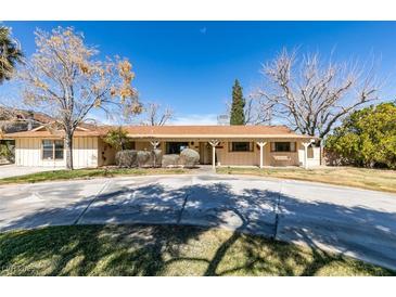 Charming ranch-style home with mature trees and circular driveway at 4530 W Maulding Ave, Las Vegas, NV 89139