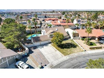 Charming home with a three-car garage, pool, and mature trees in a desirable neighborhood at 3431 Iberia St, Las Vegas, NV 89146