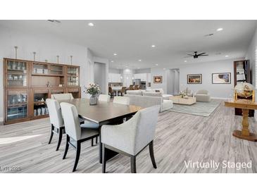 Bright and airy living room showcasing an open floor plan with modern furnishings and stylish decor at 351 Dandelion Brook Ct Ct, Las Vegas, NV 89148