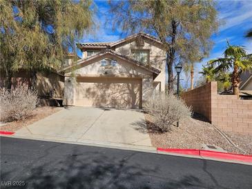 Charming two-story home featuring a two-car garage and well-maintained landscaping at 11004 Linden Leaf Ave, Las Vegas, NV 89144