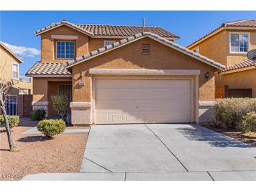 Charming two-story home featuring a two-car garage and low maintenance landscaping at 1416 Swanbrooke Dr, Las Vegas, NV 89144