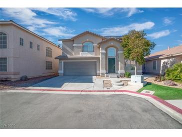 Charming two-story home featuring a well-maintained lawn and a two-car garage at 8109 Terracotta Gulf Ct, Las Vegas, NV 89143