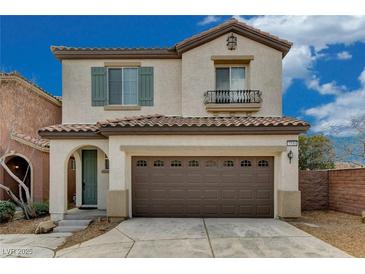 Two-story stucco home with a brown tiled roof, brown garage door, and a small balcony at 7530 Brisa Del Mar Ave, Las Vegas, NV 89179