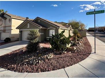 Charming single-story home with a desert-landscaped front yard and inviting curb appeal at 9721 Meadowville Ave, Las Vegas, NV 89129