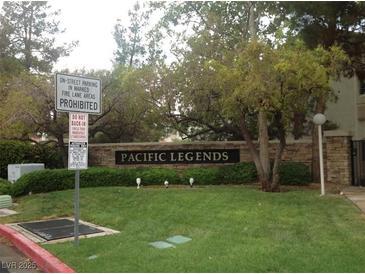 Welcoming entrance to Pacific Legends featuring well-manicured landscaping and stone signage, creating a serene atmosphere at 75 N Valle Verde Dr # 621, Henderson, NV 89074