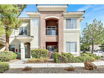 Attractive multi-story condo with private balconies and well-maintained landscaping at 9050 W Warm Springs Rd # 2153, Las Vegas, NV 89148