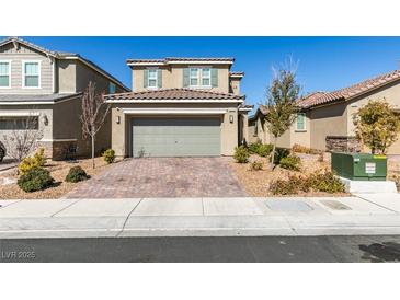 Charming two-story home featuring a well-maintained yard and a brick driveway at 3192 Bormida Ave, Henderson, NV 89044