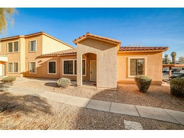 Charming one-story home with terracotta roof and inviting front entrance at 2131 Hussium Hills St # 104, Las Vegas, NV 89108