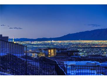 Stunning modern home showcasing city views, nestled in a hillside community for a luxurious lifestyle at 678 Blackrock Rim Dr, Henderson, NV 89012